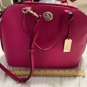 Coach Purse. NEW - Never used - Pink. Used ruler to show size.